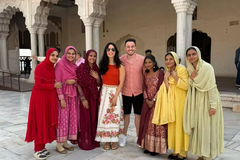 Amber Fort perched on the hill with Maota Lake in the foreground during a private Jaipur tour